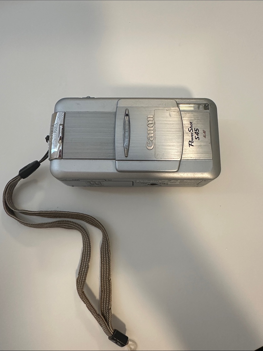 Canon Silver Compact Point-and-Shoot Camera with Wrist Strap